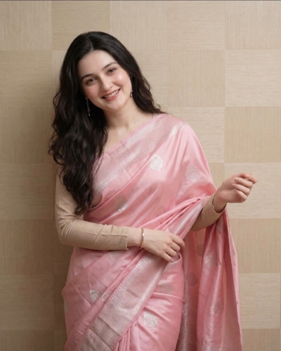 Luxury escort in Gurgaon dressed for special occasion with warm inviting smile, top independent high-class escorts in Gurgaon