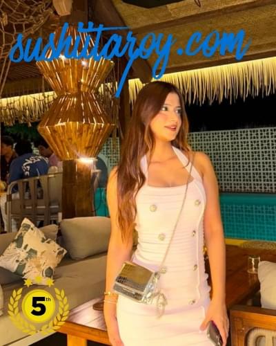 Sushimita Roy – Premium Gurgaon Escorts Service That Actually Delivers What You Need 9 Elegant high-class escort in Gurgaon posing in luxury hotel suite wearing evening dress, premium independent escort service Gurgaon