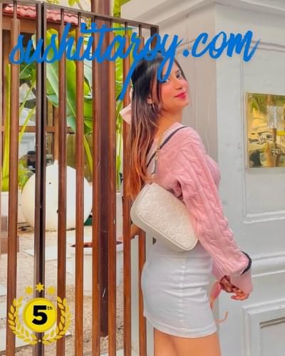 Sushimita Roy – Premium Gurgaon Escorts Service That Actually Delivers What You Need 11 Stunning independent escort Gurgaon standing beside luxury car in DLF Cyber City, exclusive premium companionship in Gurgaon